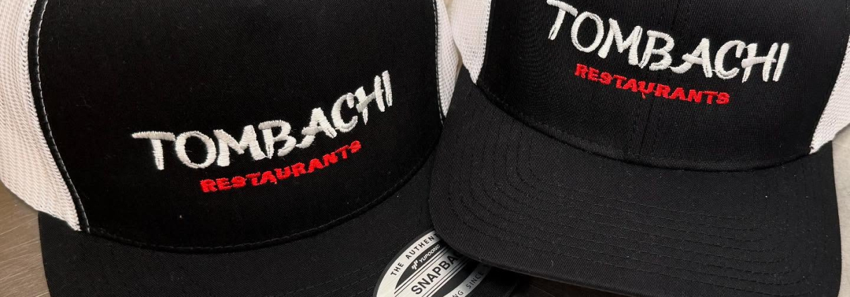 black and white Tombachi caps