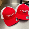 Red and white baseball caps